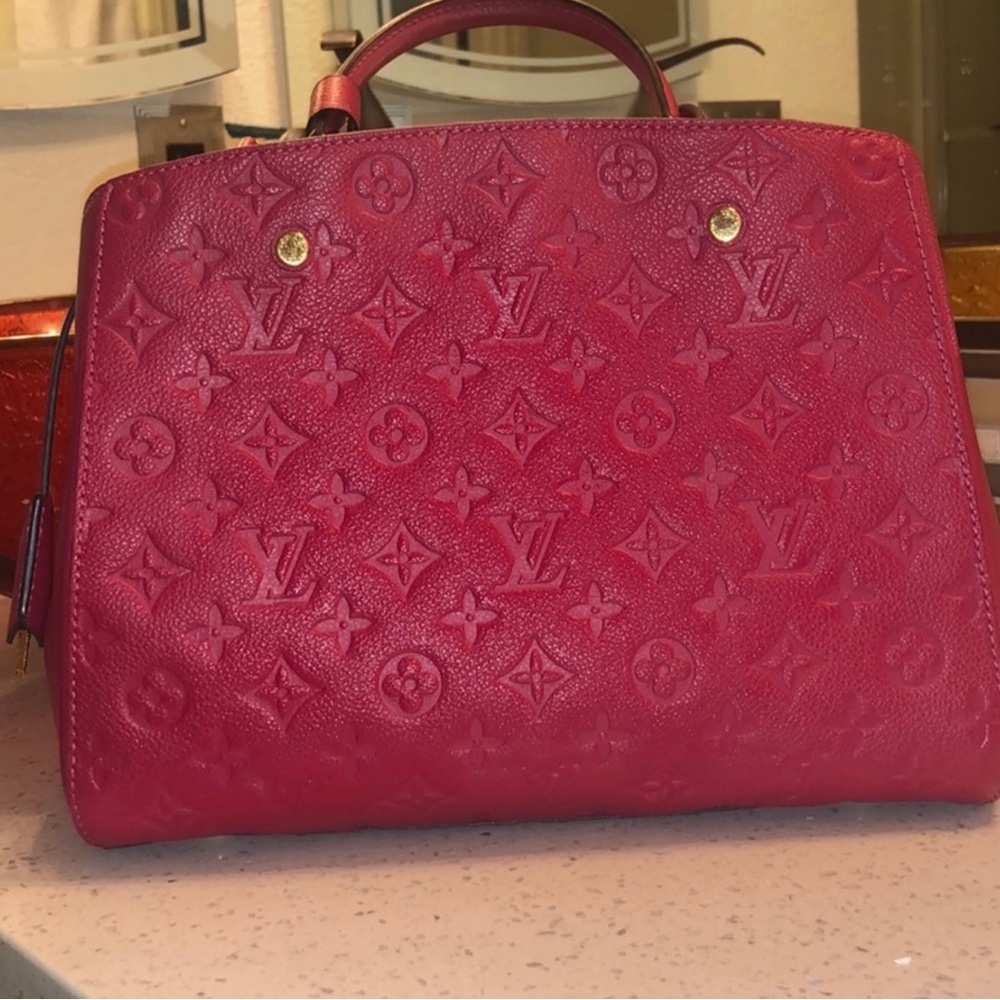 LV bag MONTAIGNE MM - raspberry color